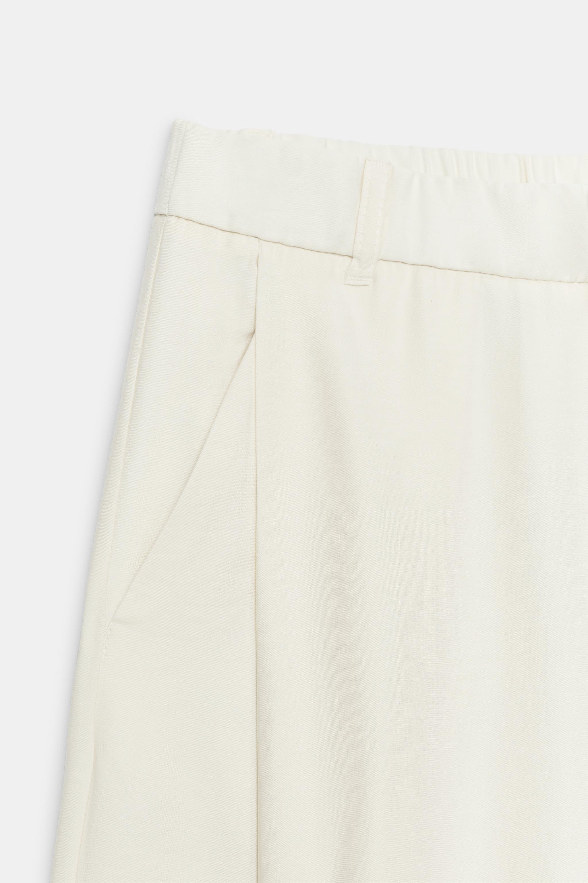 FLOWY PLEATED PANTS